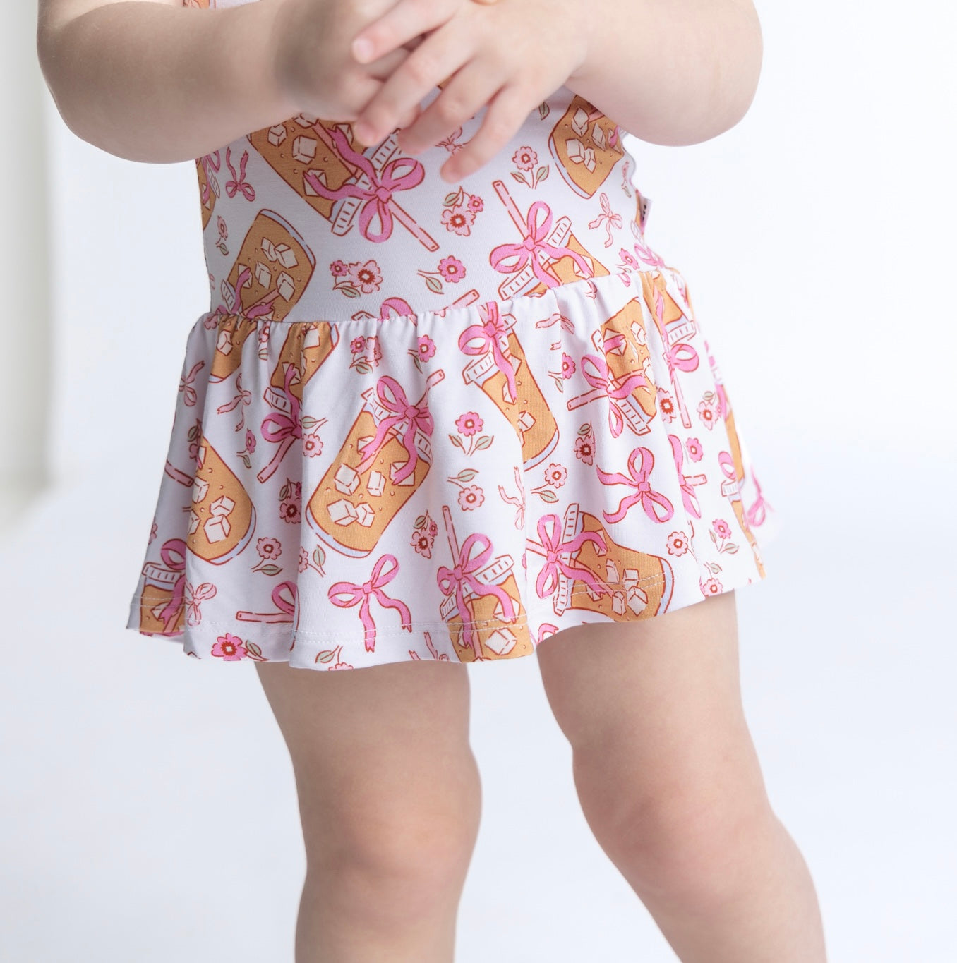 A baby in a bamboo twirl dress by Elle and Mily. Made of the most breathable fabric.