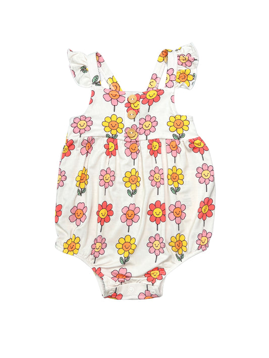 Cute bamboo romper with a smiling daisy print, perfect for girly girls, with matching bamboo daywear and pajamas available.