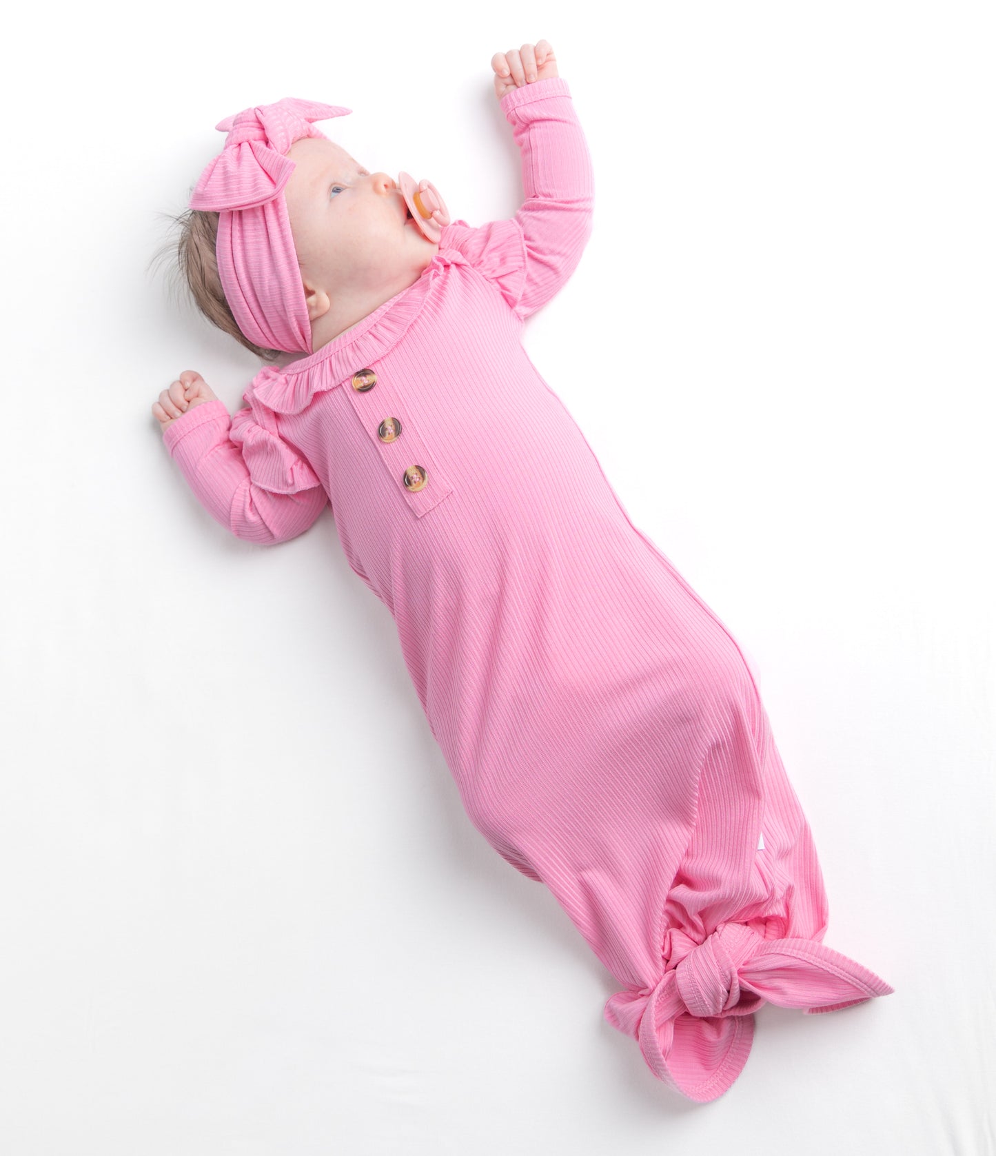 Pink bamboo knotted gown and bow set for newborn.