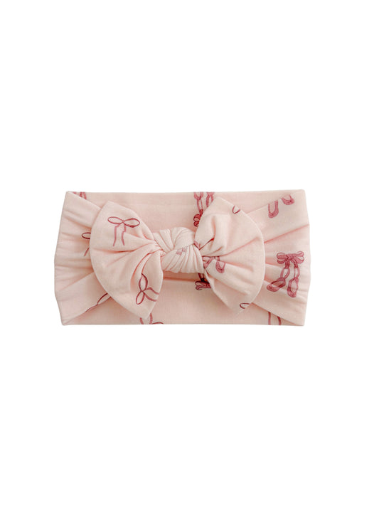 Newborn Knot headband bow with dainty bows and ballet slippers.