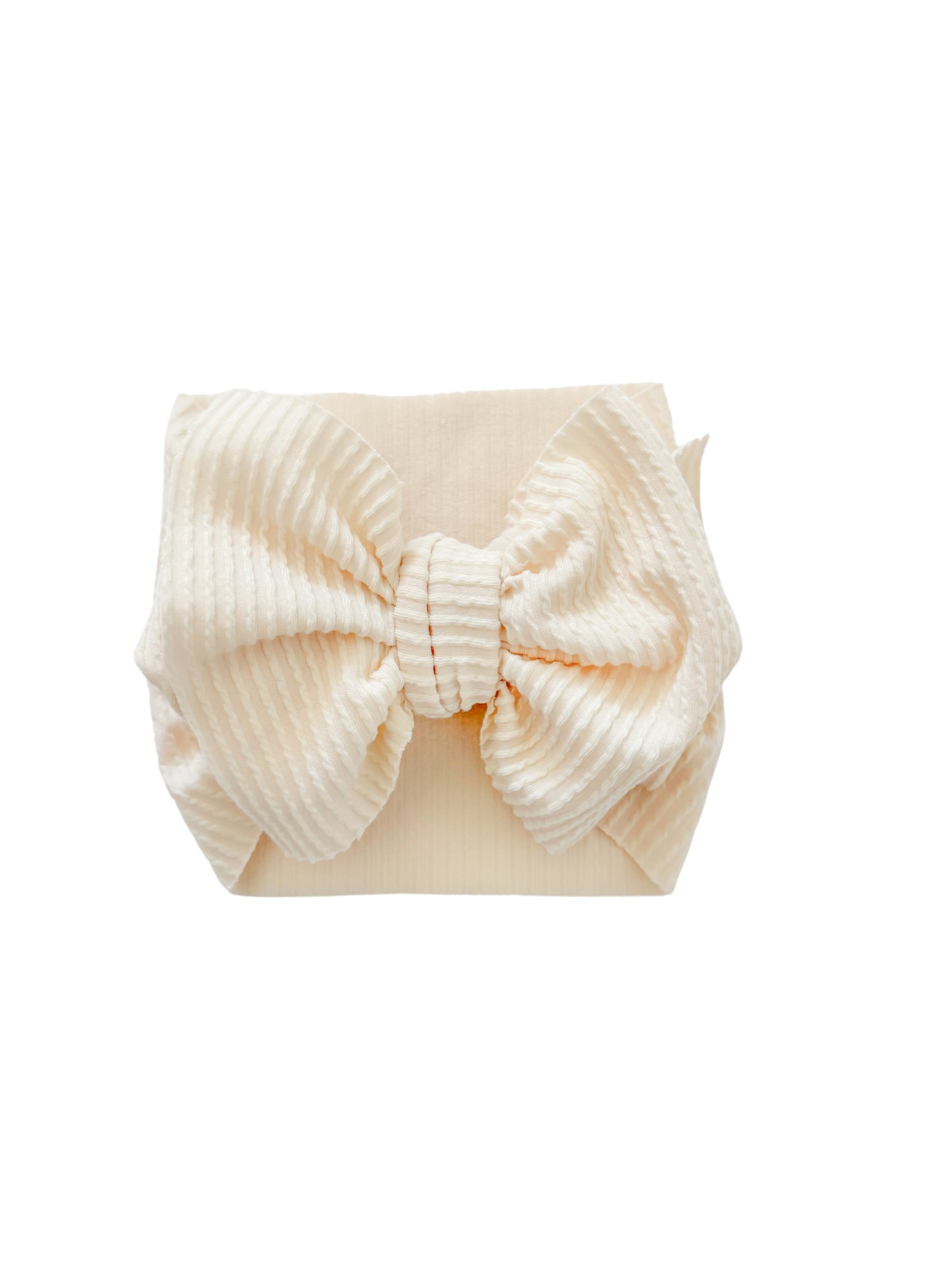 Ivory baby headwrap bow.