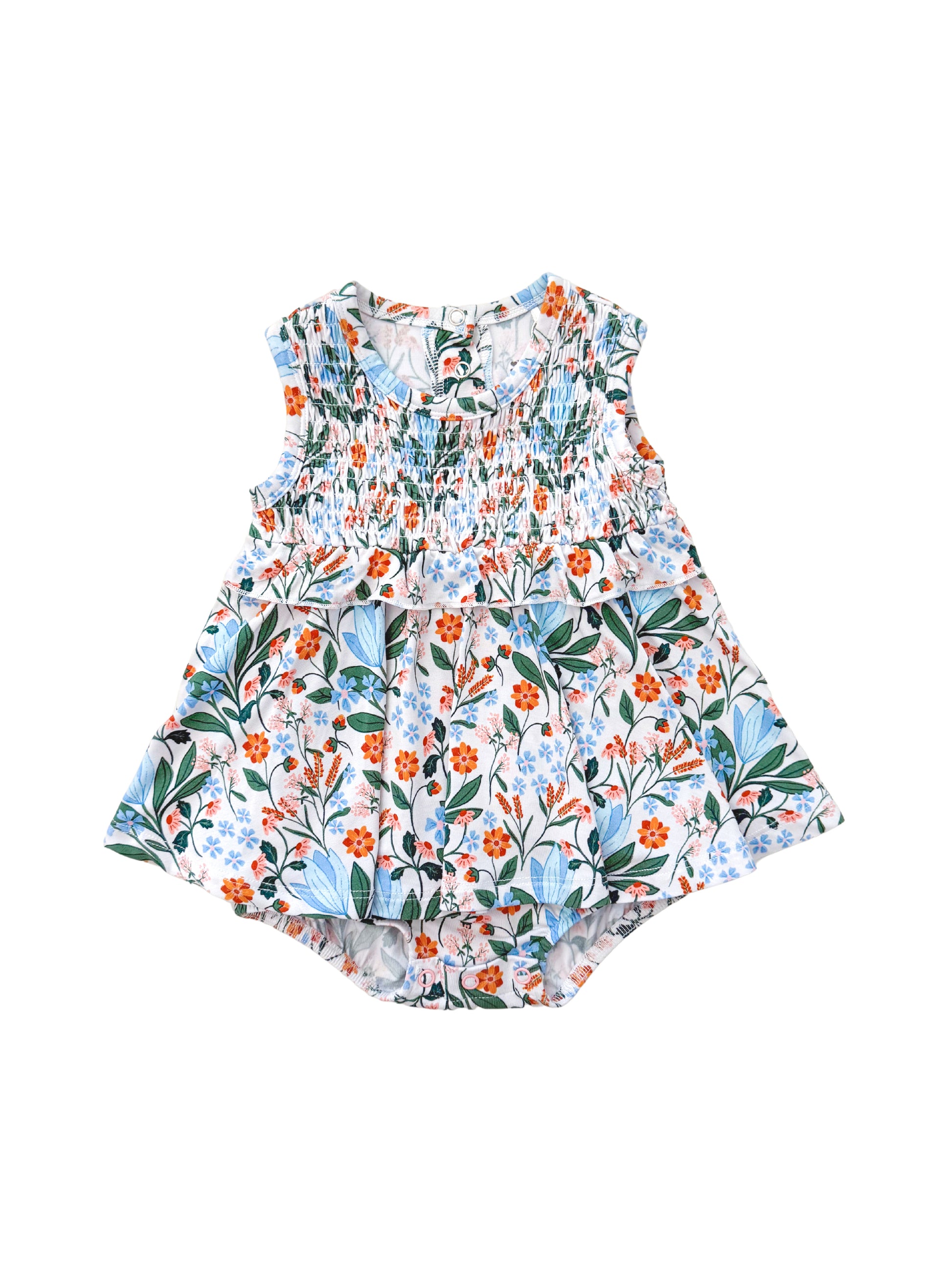Shop our bamboo smocked bubble romper with a skirted design for babies, featuring a soft blue and pink spring floral print. Eco-friendly and breathable fabric for all-day comfort.
