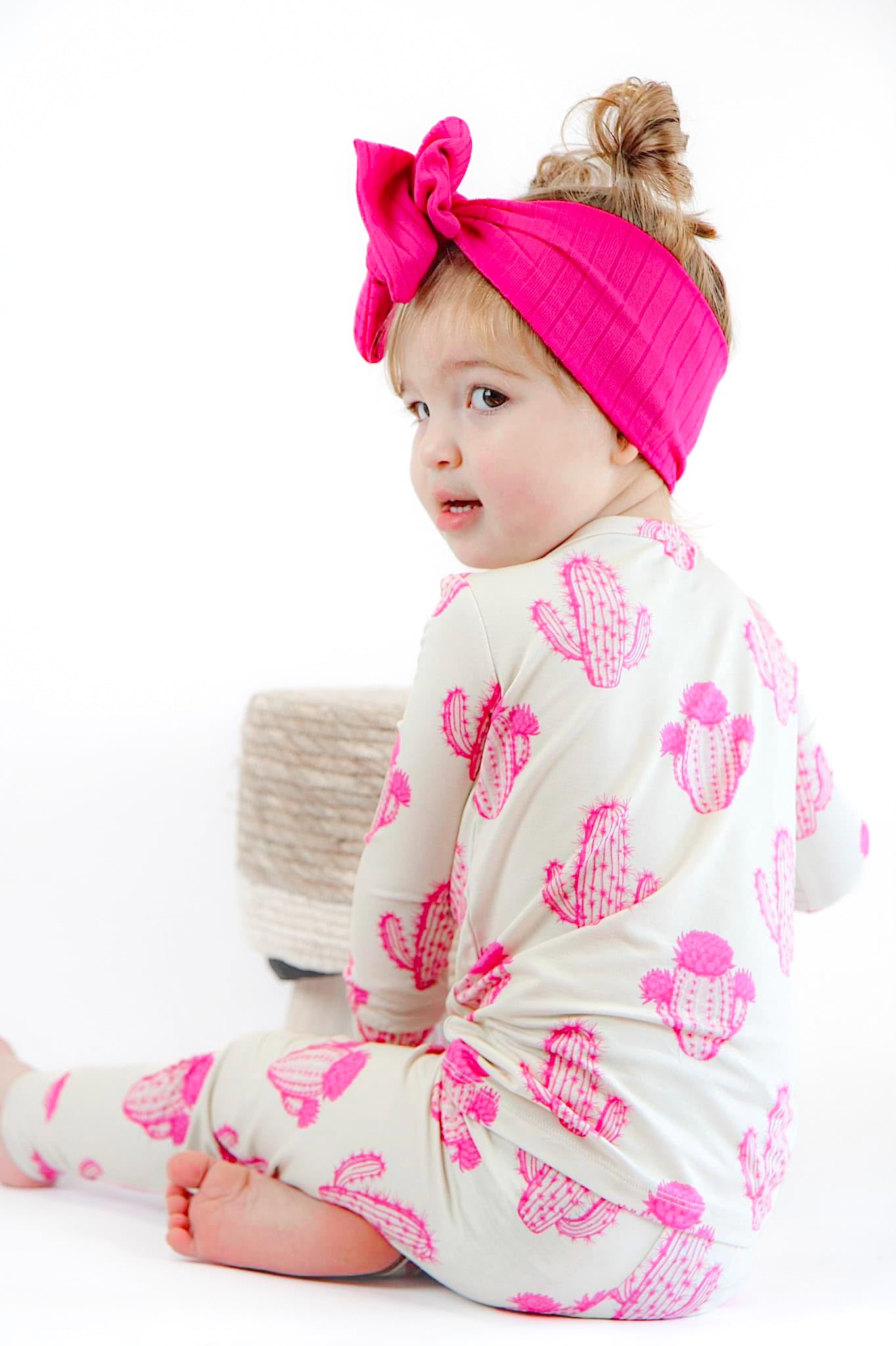 Pink cactus cowgirl bamboo pajamas for toddlers.