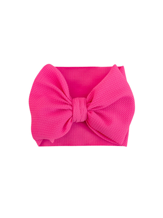 Baby girl hot pink headwrap bow.