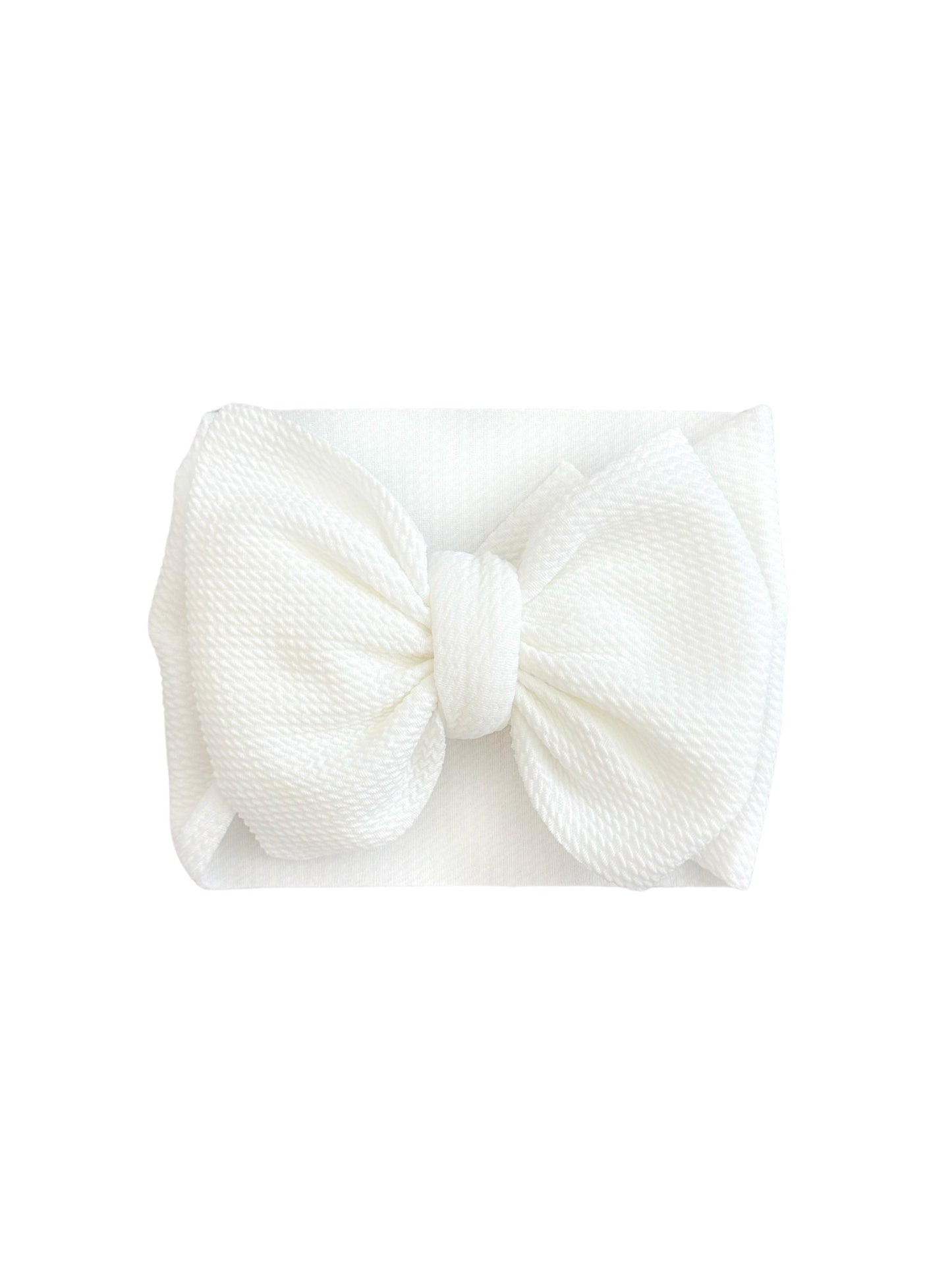 White bow headband on a white background