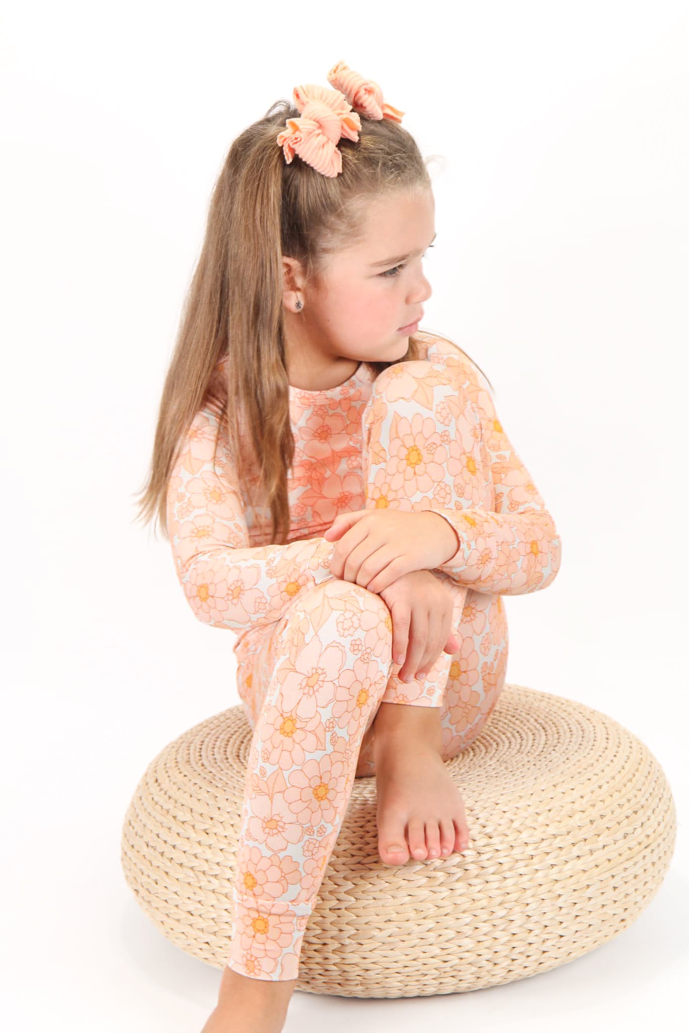 Toddler wearing floral two-piece pajamas