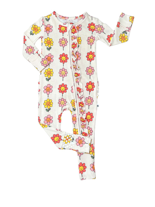 Soft bamboo convertible zip romper with a fun smiling daisy print, perfect for comfy everyday wear.