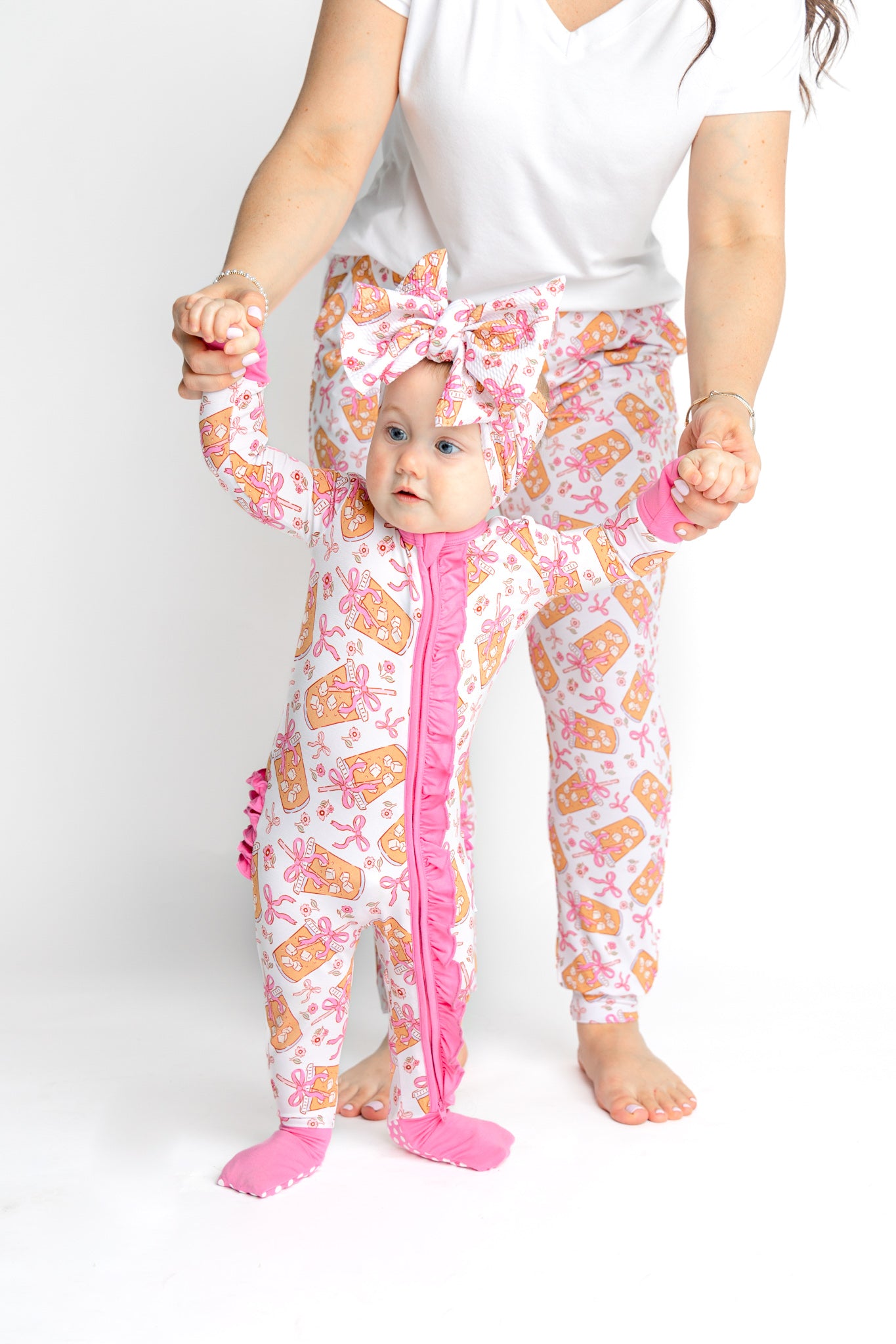 Bows and coffee bamboo convertible zip romper, made of soft bamboo for baby's sensitive skin. 