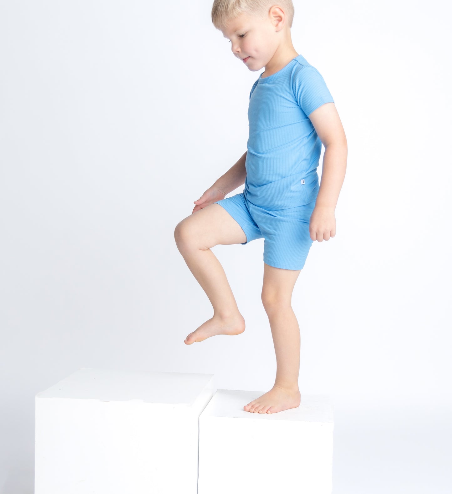 Blue ribbed bamboo pajama set for toddlers and kids, crafted from soft, breathable, and eco-friendly bamboo fabric for all-night comfort. Perfect for sleep!