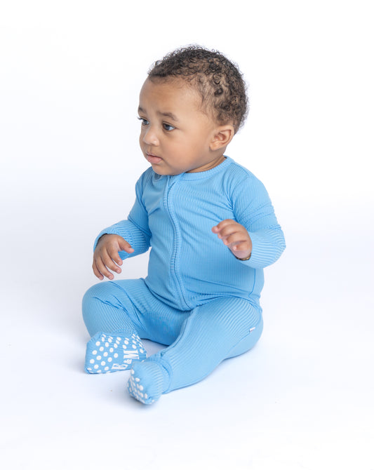 Blue ribbed bamboo convertible sleeper footie for babies, made from soft, breathable, and eco-friendly bamboo fabric for ultimate comfort and easy dressing. Shop now!