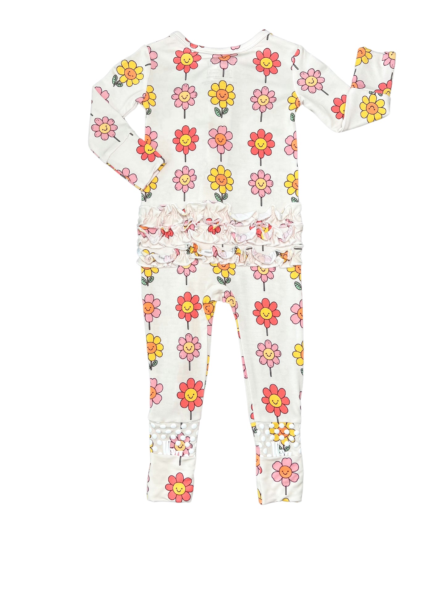 Our bamboo romper features cute ruffle details on the back and a fun smiling daisy print.