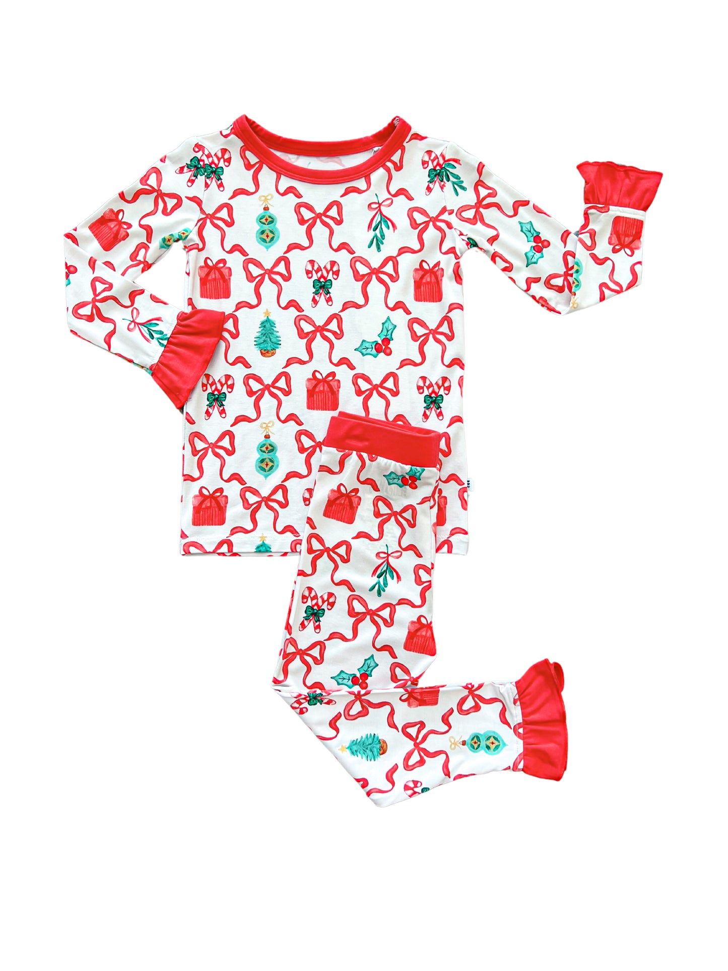 Cozy two-piece bamboo set with ruffle cuffs featuring a festive Christmas print of bows and candy canes.