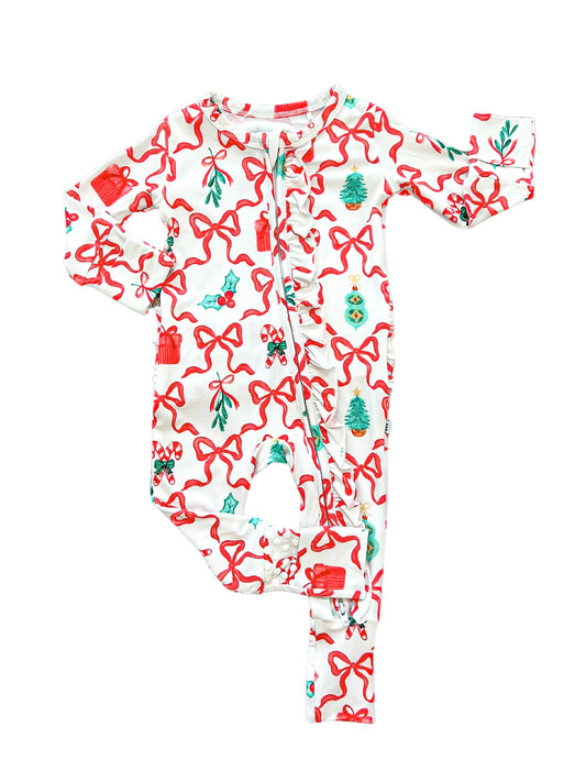 Cozy bamboo convertible footie with a festive Christmas print featuring bows and candy canes, designed with a two-way zip for easy diaper changes.