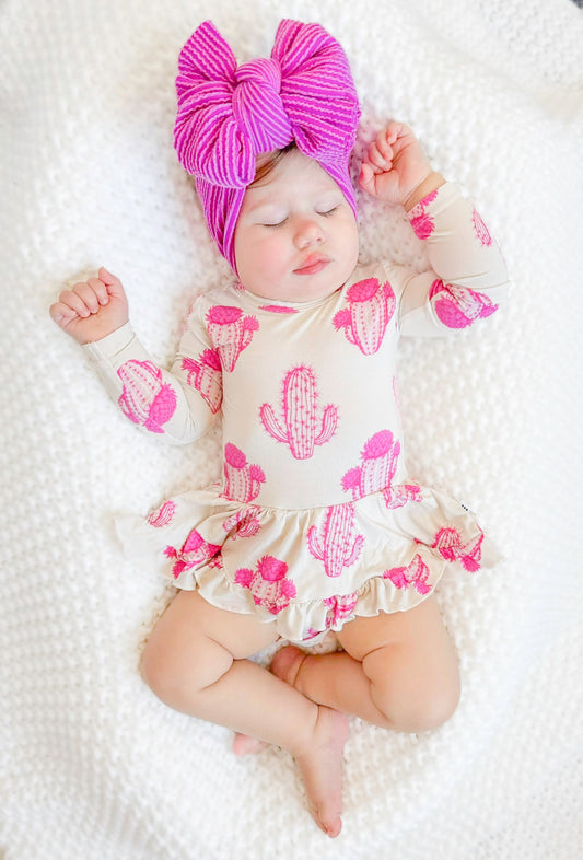 Pink cowgirl baby twirl skirted bodysuit dress. 