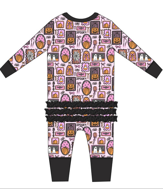 pajama sets with a Halloween-themed pattern on a white background