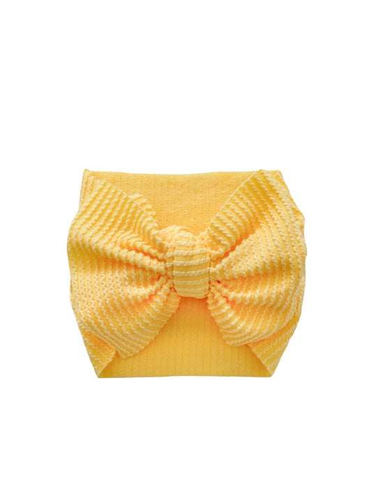 Yellow ribbed headwrap bow for newborn and toddler. 